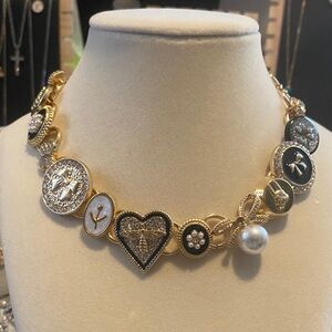 Elegant Gold and Black Charm Necklace